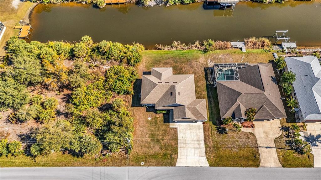 9500 Singer Circle Port Charlotte, FL 33981 - Photo 54 of 60 an aerial view of a house with a lake view