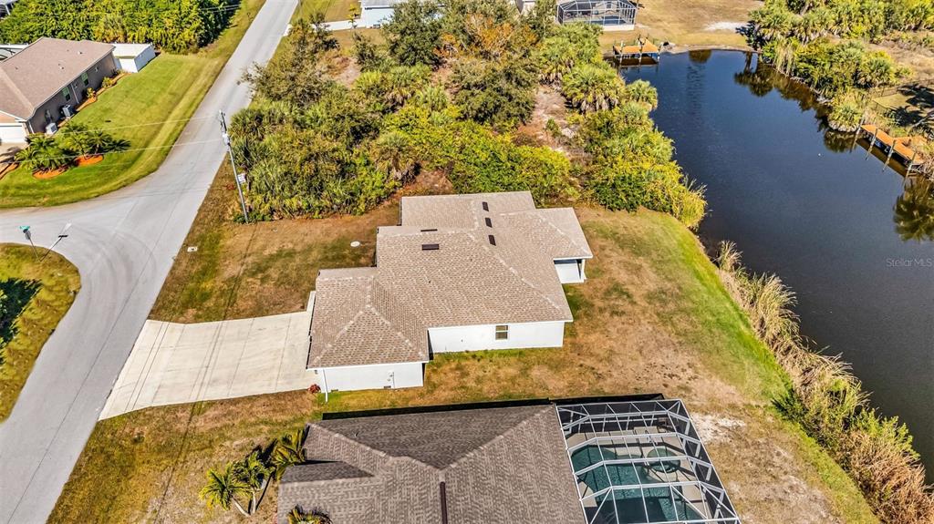 9500 Singer Circle Port Charlotte, FL 33981 - Photo 59 of 60 an aerial view of a house with a yard