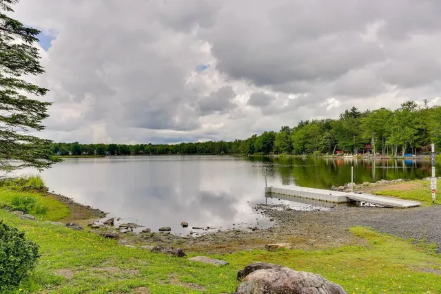 a view of a lake in middle of a house