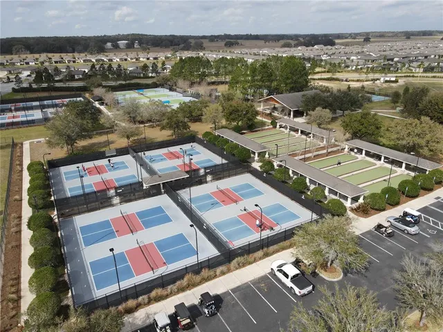 an aerial view of a house with a lake view
