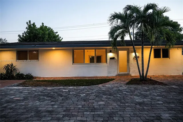 a view of swimming pool with a yard