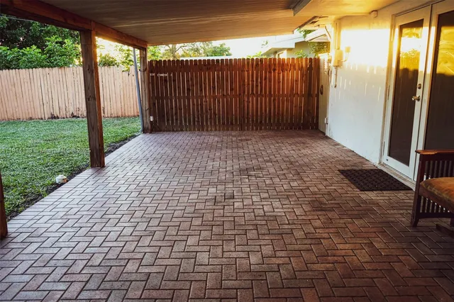 a view of a backyard with a garden