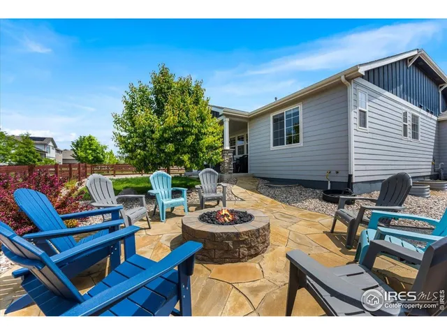 a backyard of a house with seating space