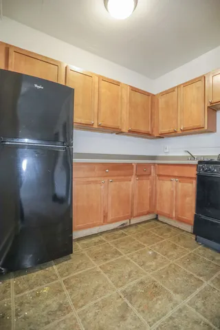 a view of a kitchen with a sink