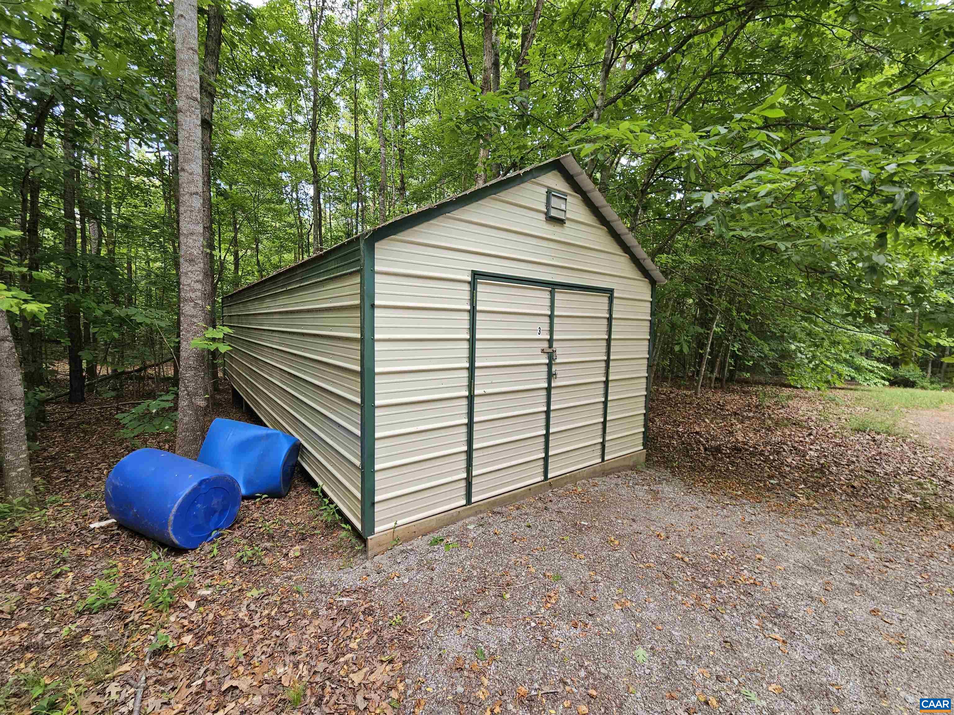 981 Scotts Bottom Road Dillwyn, VA 23936 - Photo 36 of 62 a view of a house with a backyard