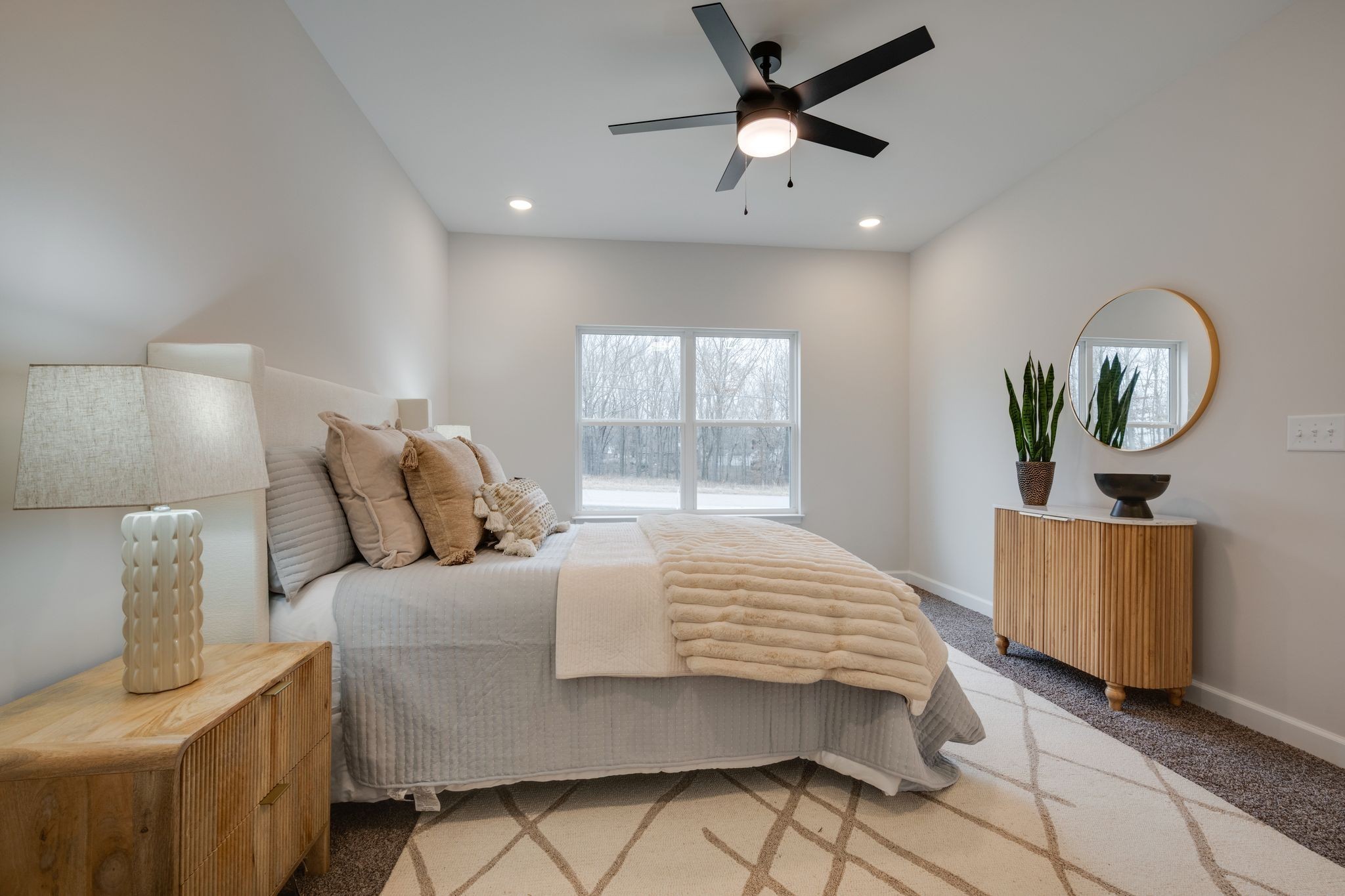 57 Truform Way Dickson, TN 37055 - Photo 13 of 29 a bedroom with a bed chandelier and window