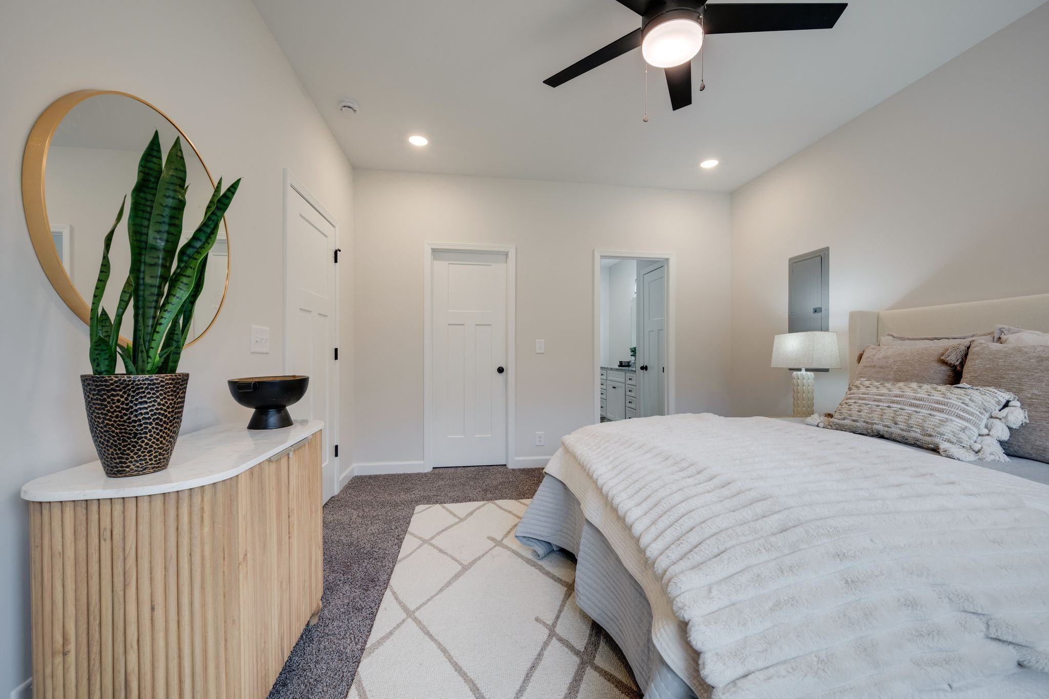 57 Truform Way Dickson, TN 37055 - Photo 14 of 29 a bedroom with a bed and a chandelier