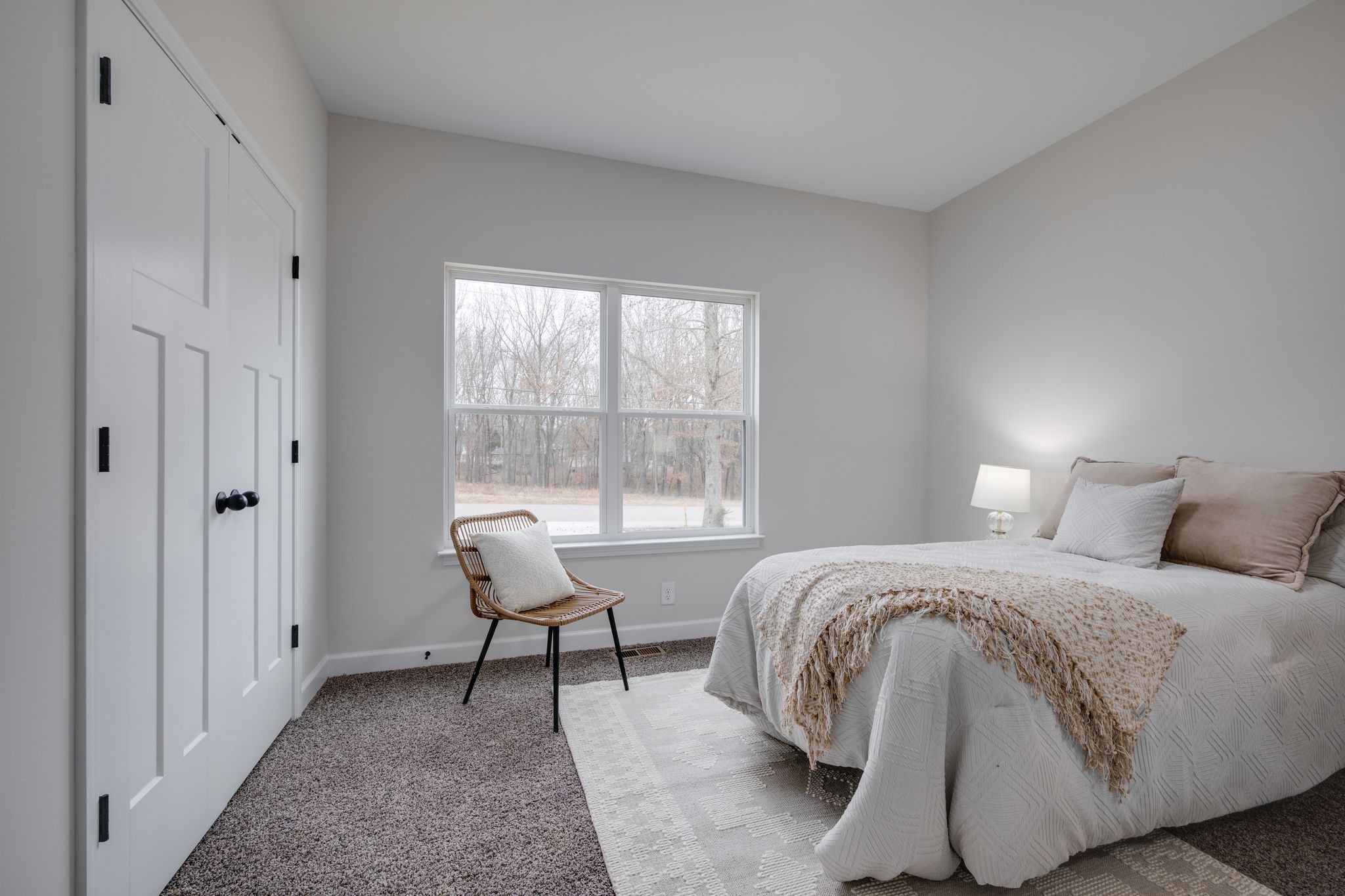 57 Truform Way Dickson, TN 37055 - Photo 18 of 29 a spacious bedroom with a bed and chair