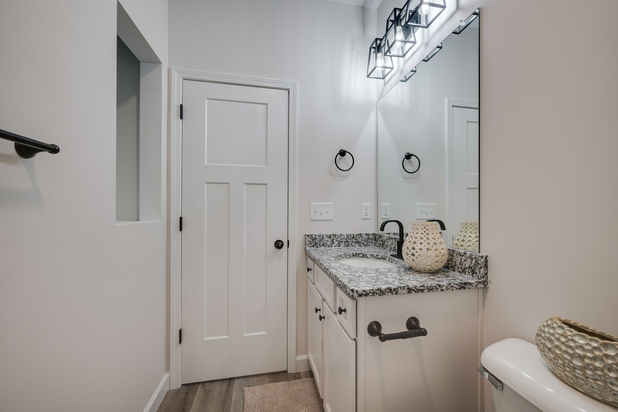 57 Truform Way Dickson, TN 37055 - Photo 21 of 29 a bathroom with a granite countertop sink a mirror and shower