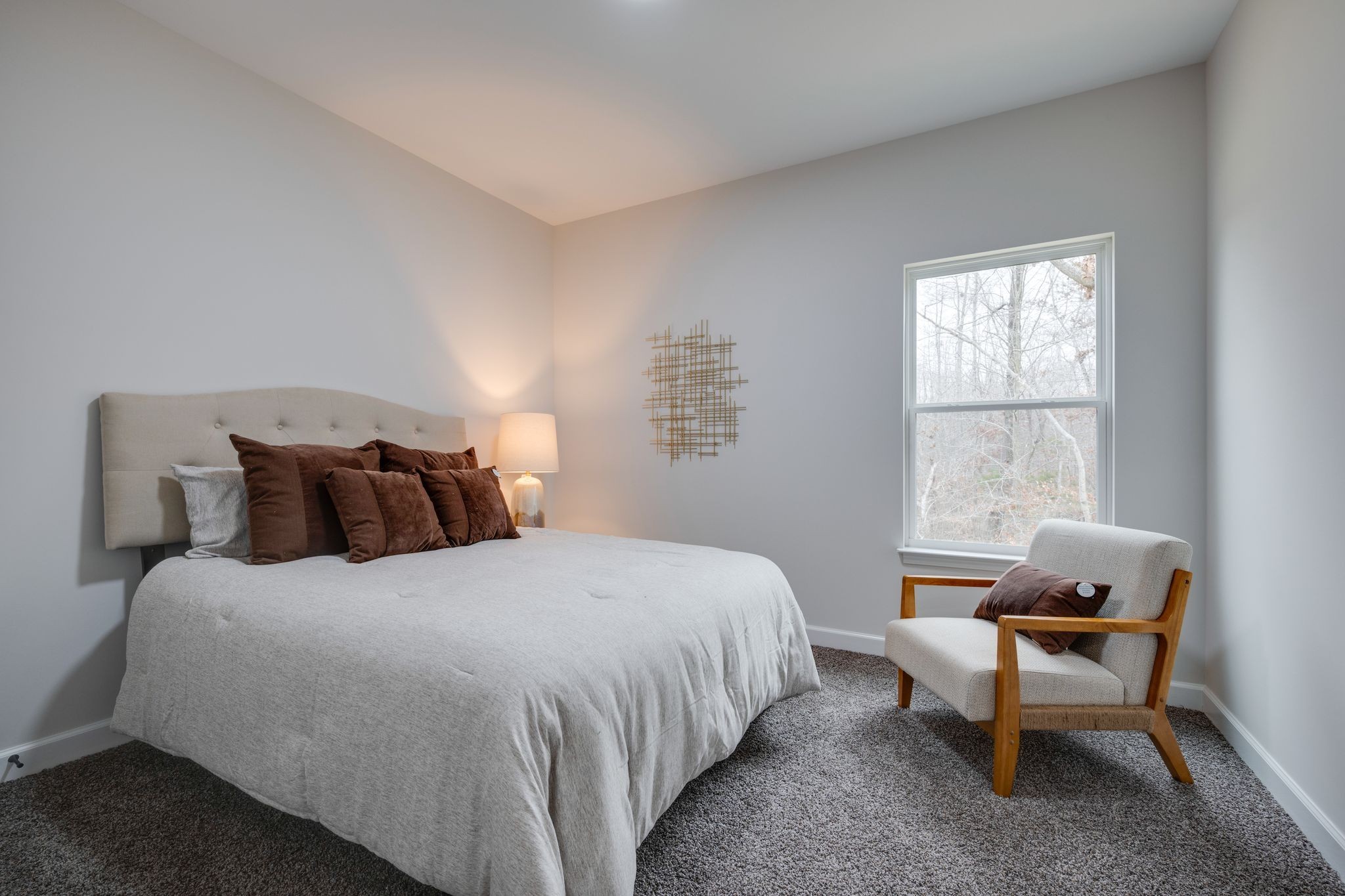 57 Truform Way Dickson, TN 37055 - Photo 22 of 29 a bedroom with a bed chair and window