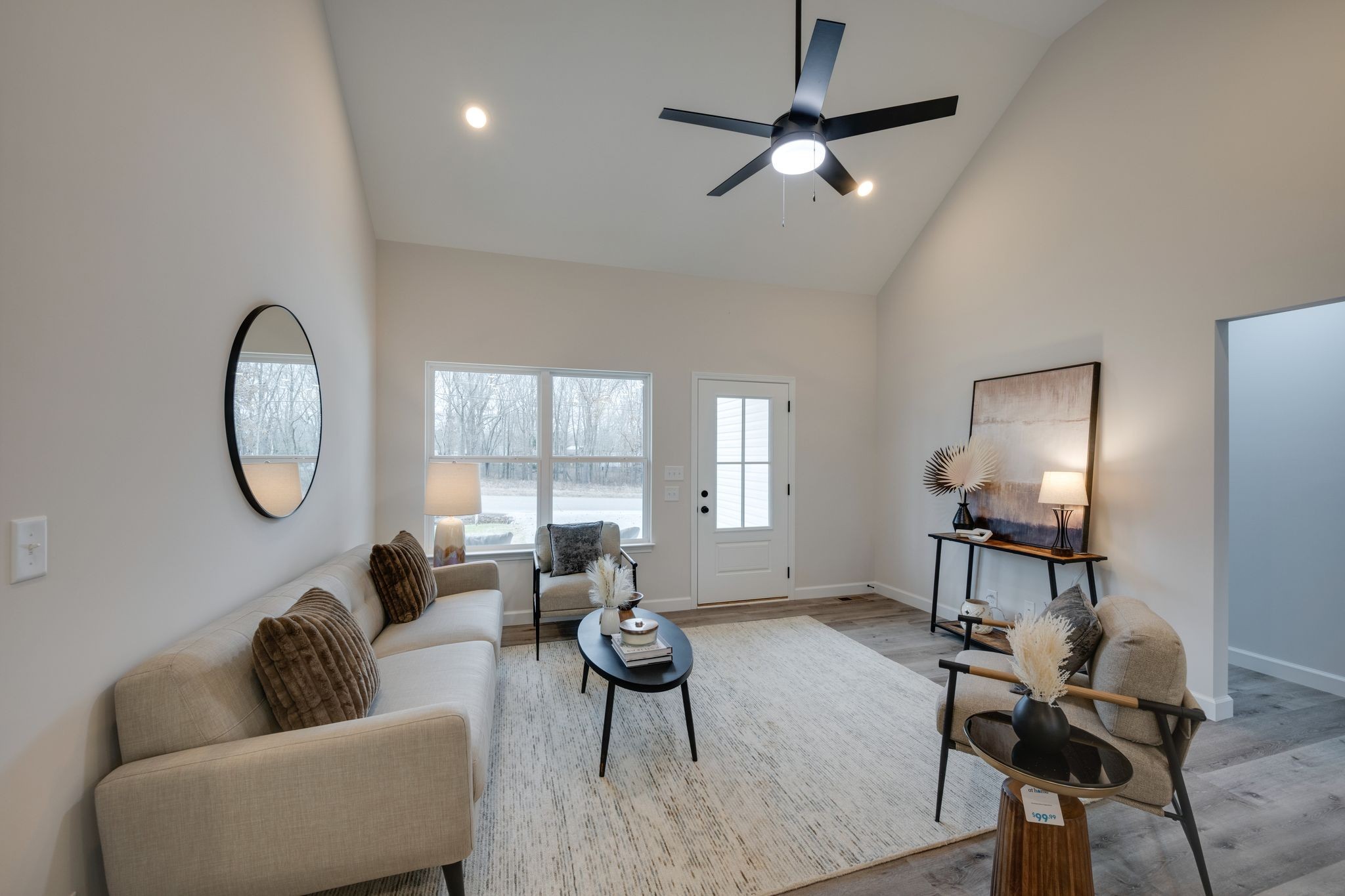 57 Truform Way Dickson, TN 37055 - Photo 6 of 29 a living room with furniture a large window and a chandelier