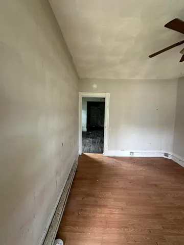 a view of an empty room and window