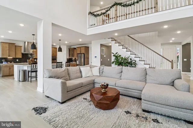 a view of a workspace with furniture and bathroom