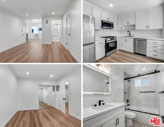 a view of kitchen with refrigerator and sink