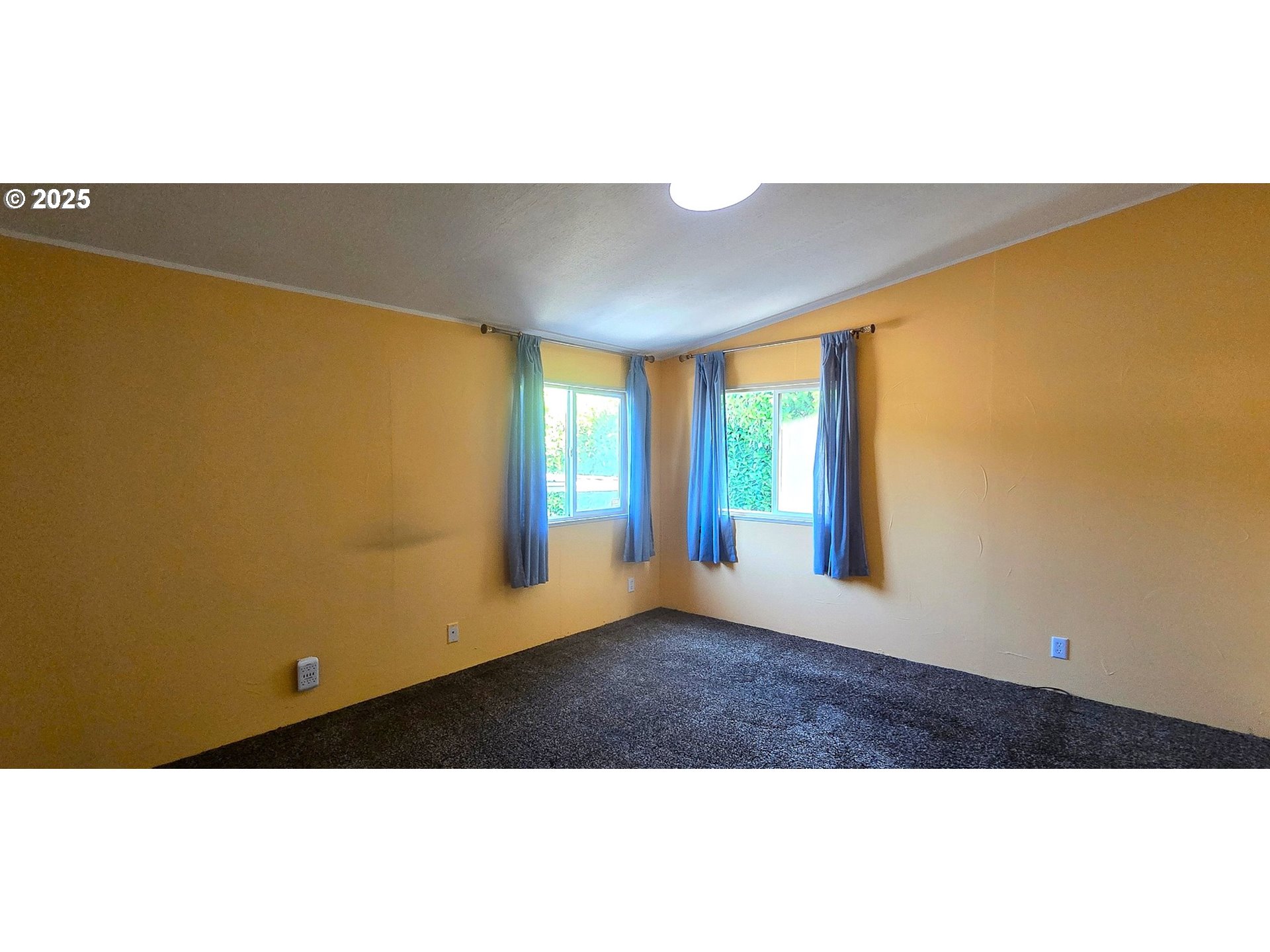 835 Southeast 1st Avenue, Unit 64 Canby, OR 97013 - Photo 22 of 37 a view of an empty room with a window