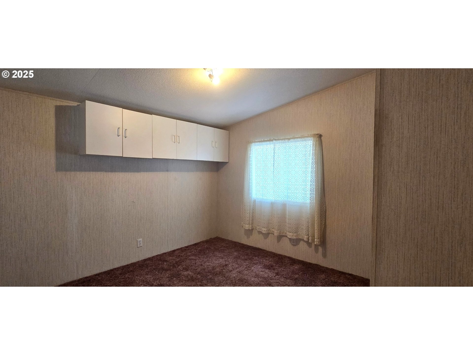 835 Southeast 1st Avenue, Unit 64 Canby, OR 97013 - Photo 26 of 37 a view of an empty room