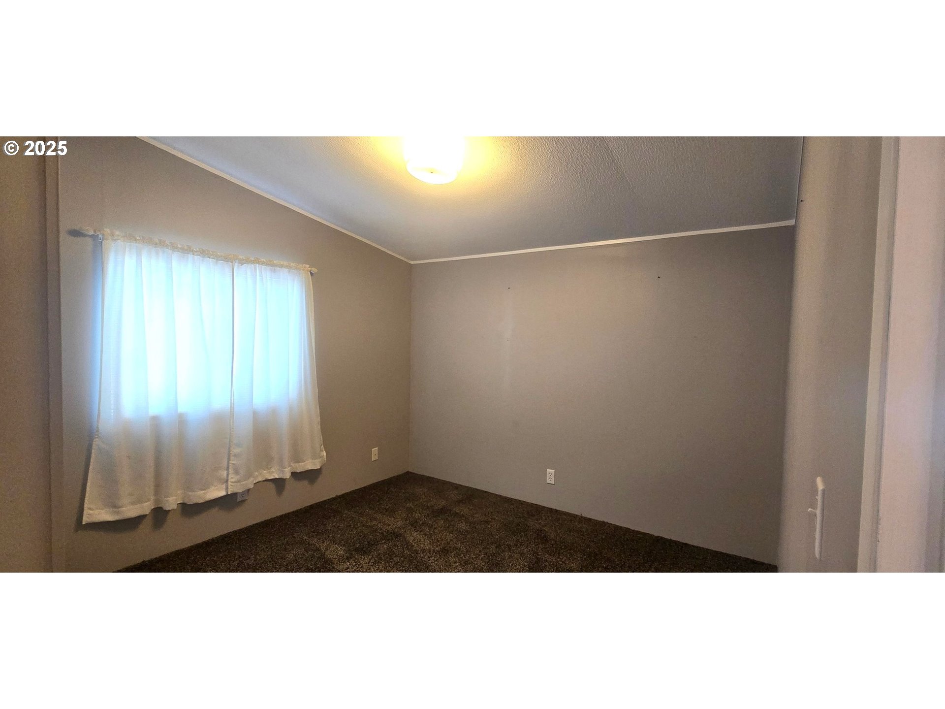 835 Southeast 1st Avenue, Unit 64 Canby, OR 97013 - Photo 27 of 37 a view of an empty room
