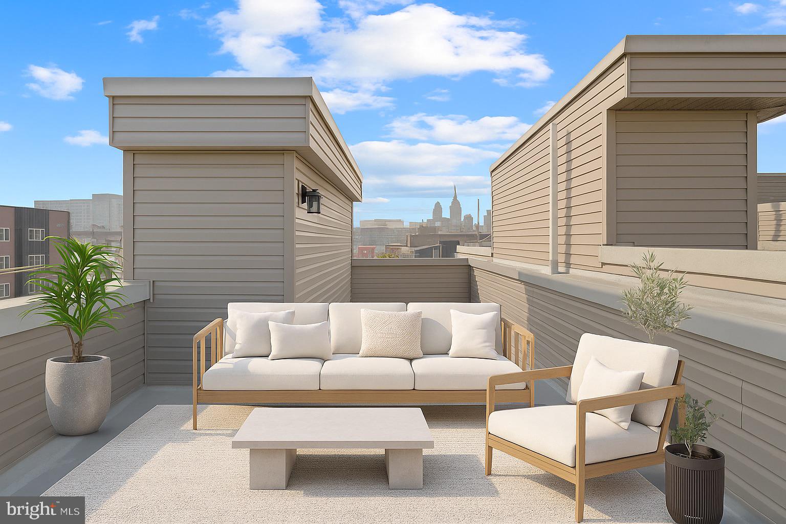 1432 Ogden Street, Unit 2 Philadelphia, PA 19130 - Photo 7 of 16 a view of a patio with couches table and chairs