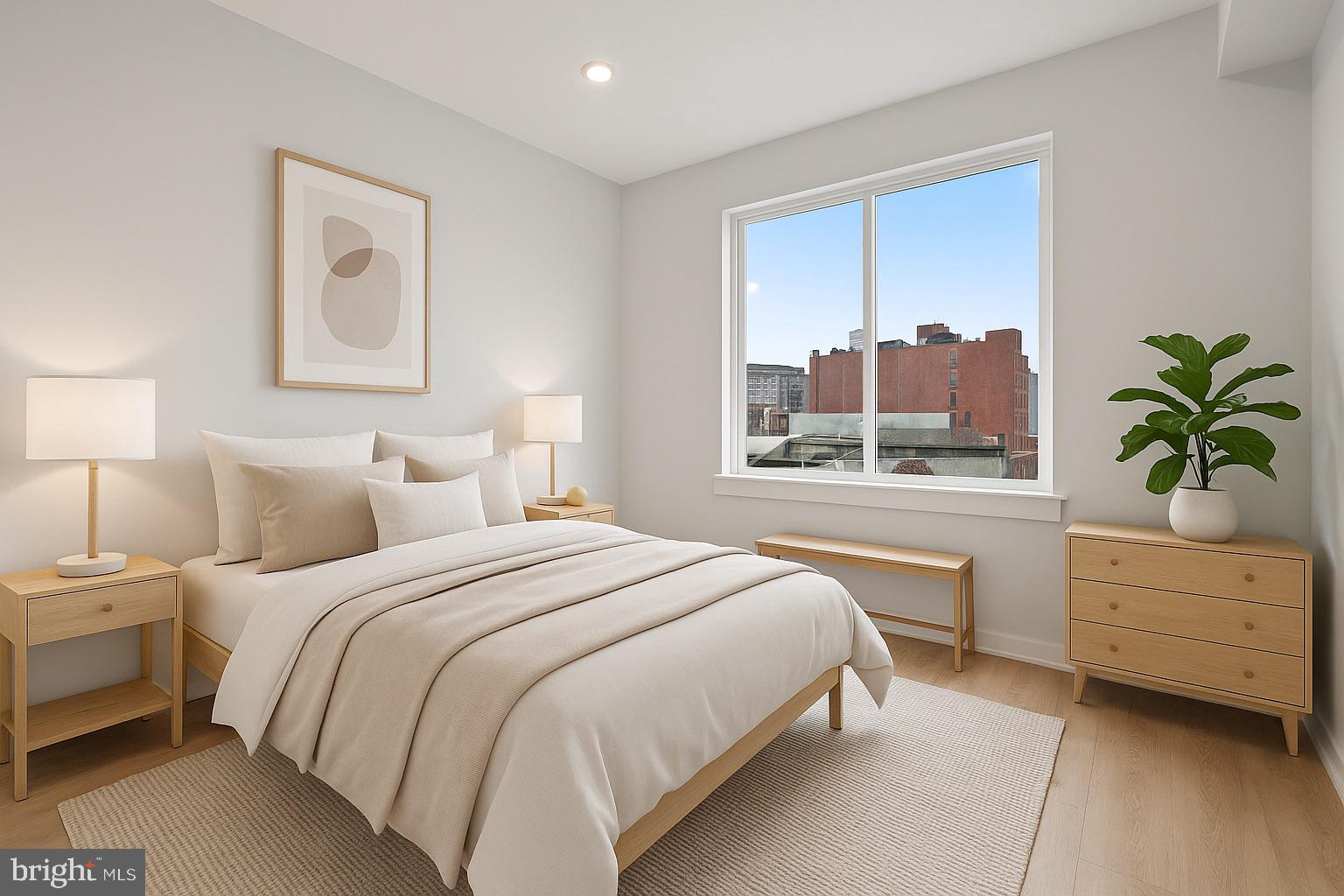 1432 Ogden Street, Unit 2 Philadelphia, PA 19130 - Photo 9 of 16 a bedroom with a bed and a closet