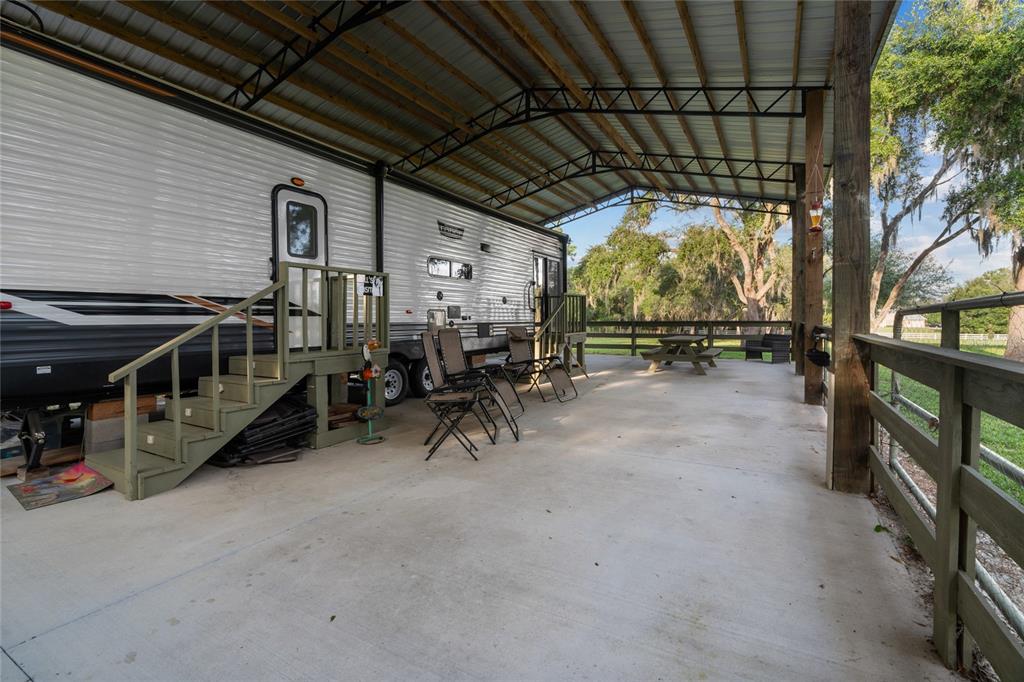 21679 Southwest 106th Lane Road Dunnellon, FL 34431 - Photo 42 of 88 a view of outdoor space with seating area