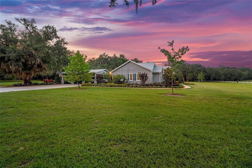 21679 Southwest 106th Lane Road Dunnellon, FL 34431 - Photo 69 of 88 a view of a house with a big yard