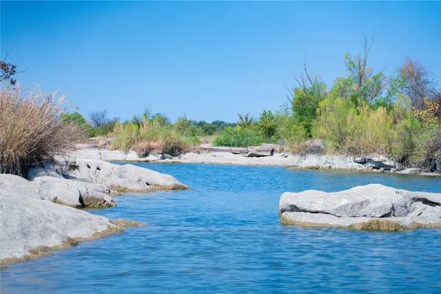 a view of a backyard of a house