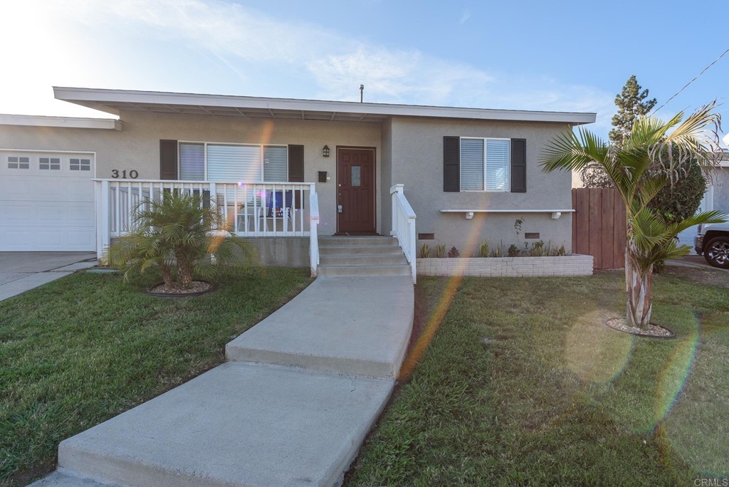 310 El Monte Road El Cajon, CA 92020 - Photo 1 of 1 a view of a house with a yard