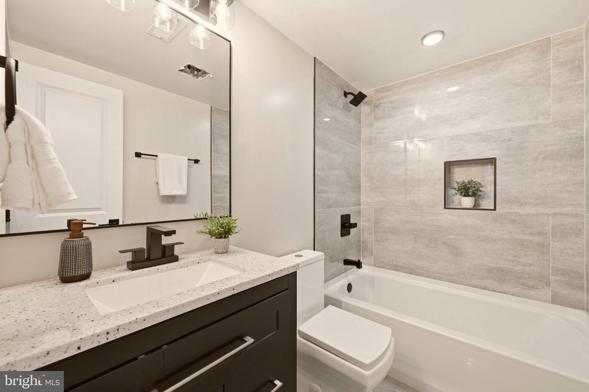 724 Rock Creek Church Road Northwest, Unit B Washington, DC 20010 - Photo 6 of 18 Sleek modern bathroom oasis.