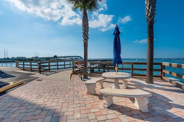a view of a terrace with furniture