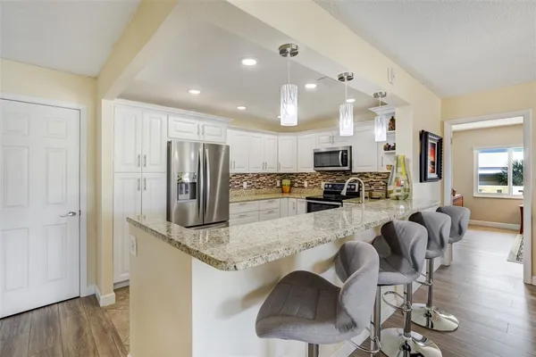 $459,000 | 100 Bluff View Drive, Unit 115C, Belleair Bluffs, FL 33770