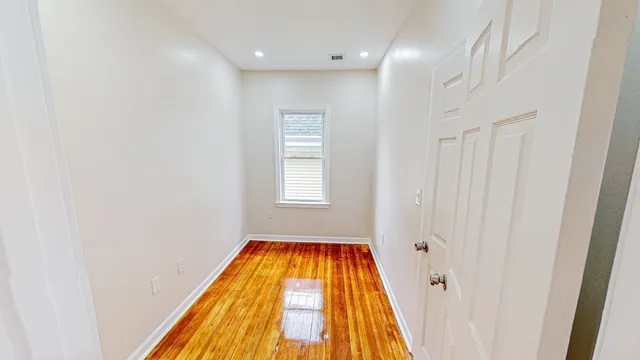 a bathroom with a bathtub and shower