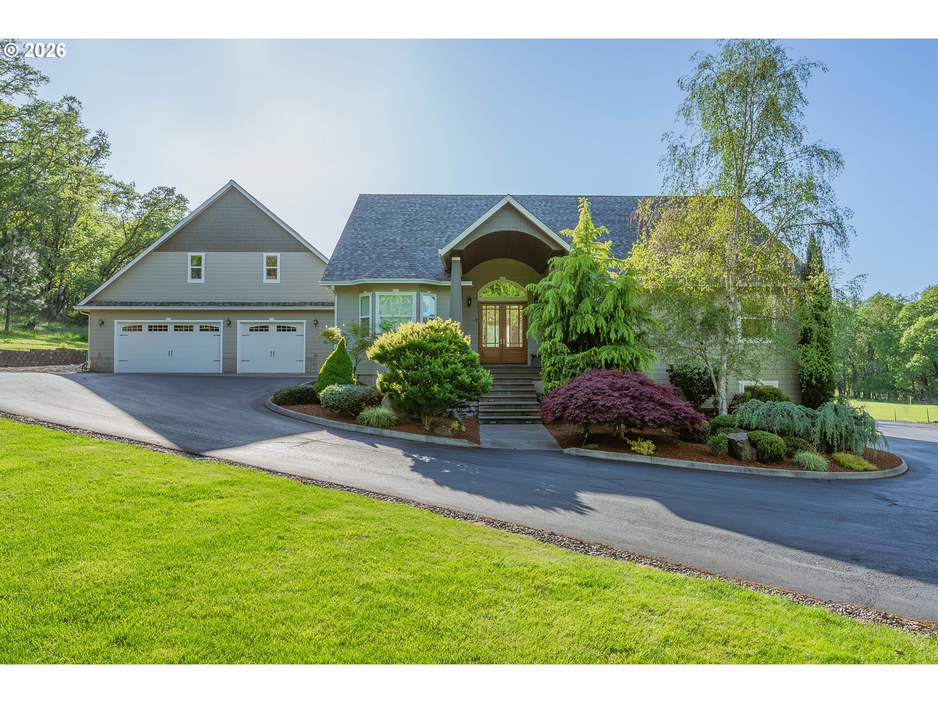 a house view with a garden space