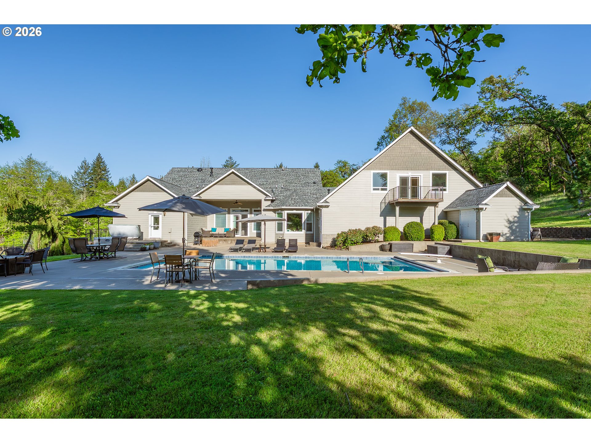 2700 Melrose Road Roseburg, OR 97471 - Photo 2 of 48 a aerial view of a house with swimming pool and porch with furniture