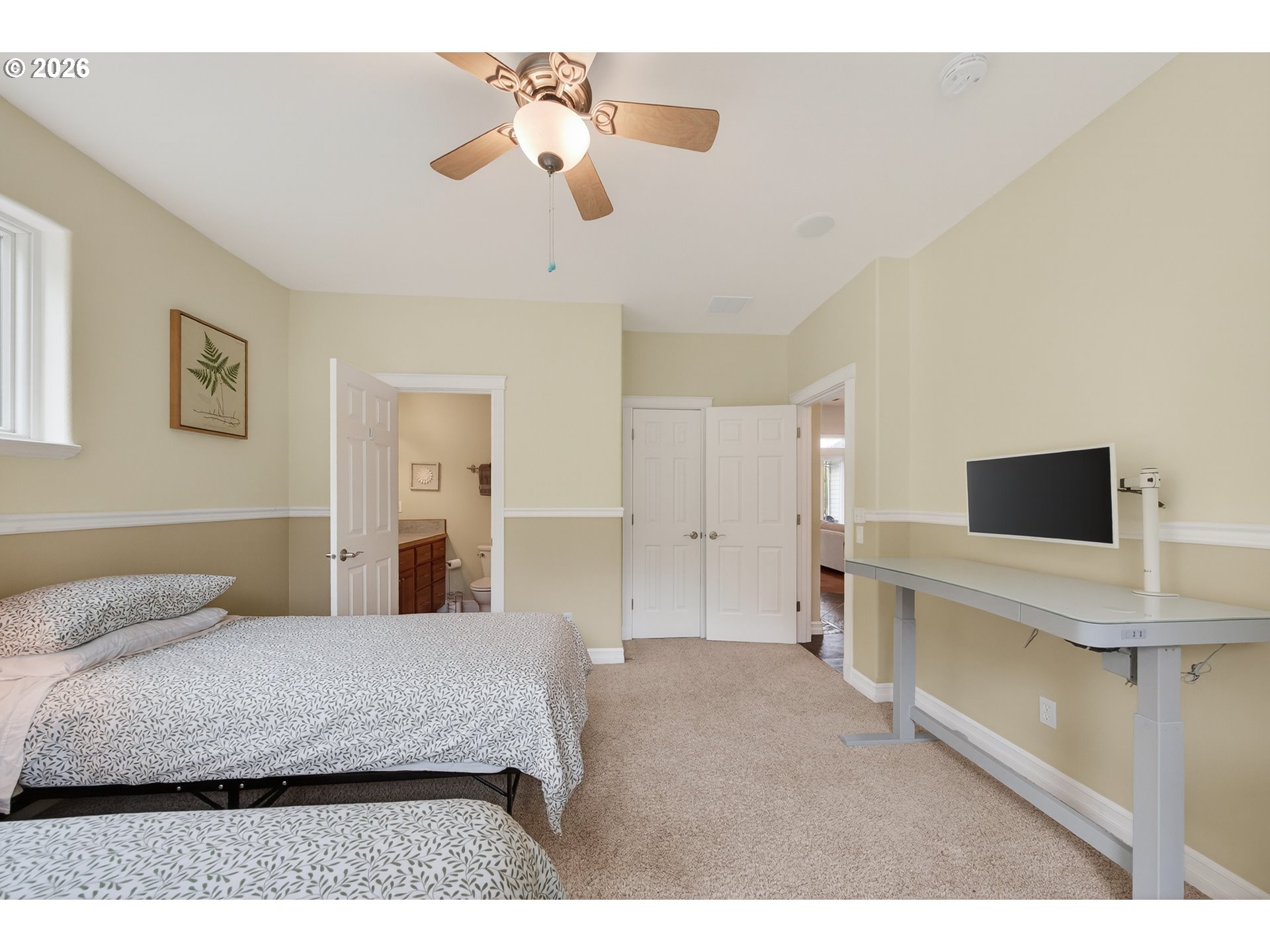 2700 Melrose Road Roseburg, OR 97471 - Photo 25 of 48 a bedroom with a bed and a chandelier