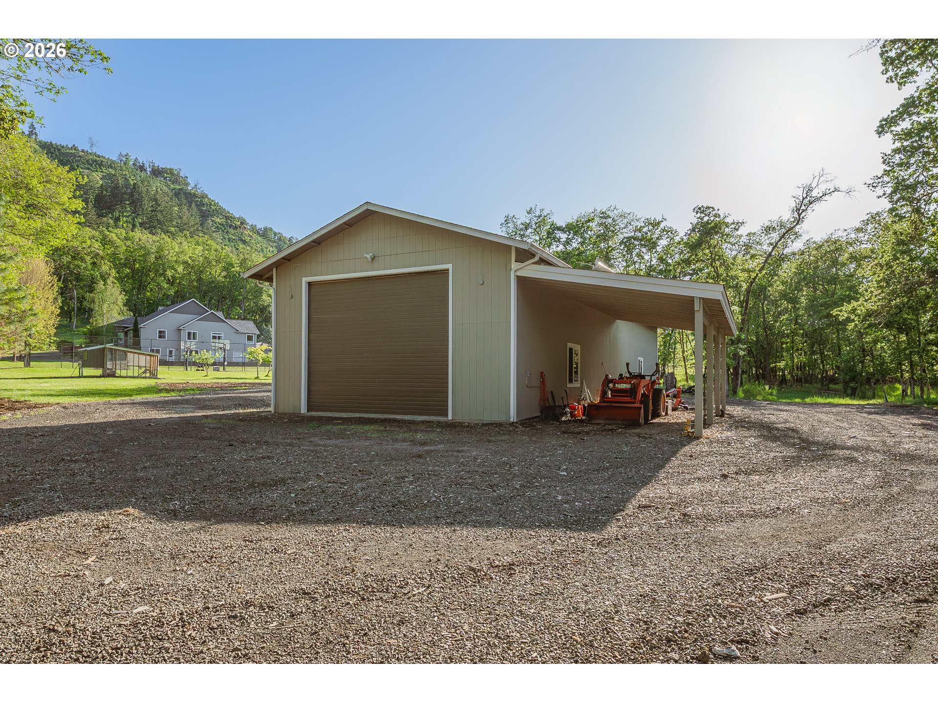 2700 Melrose Road Roseburg, OR 97471 - Photo 38 of 48 a view of a house with a yard and garage