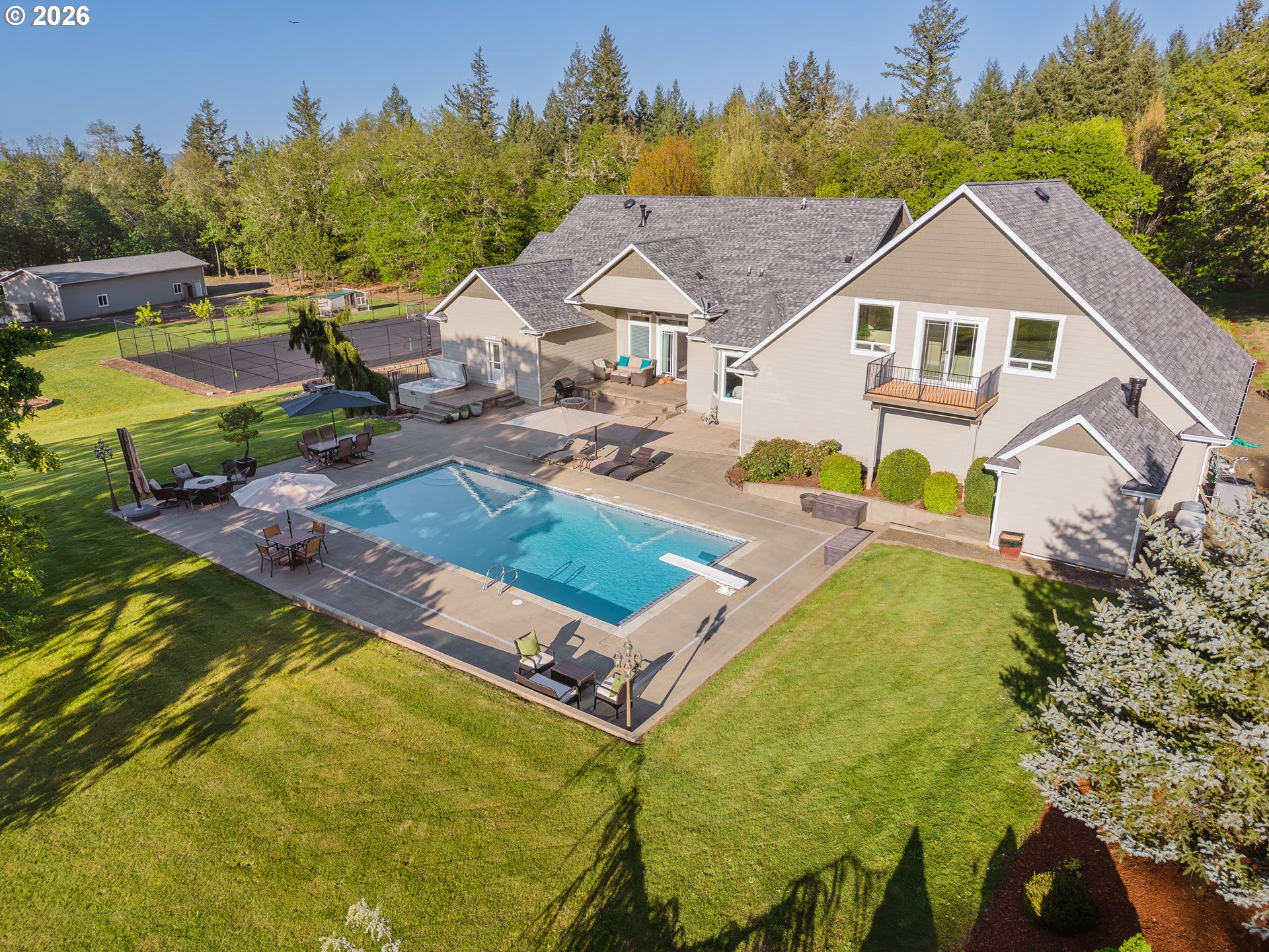 2700 Melrose Road Roseburg, OR 97471 - Photo 41 of 48 a aerial view of a house with swimming pool and sitting area