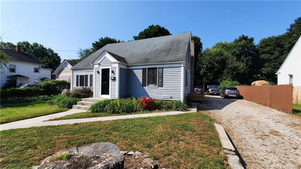 103 Furnace Street Killingly, CT 06239 - Photo 1 of 1 a front view of a house with garden