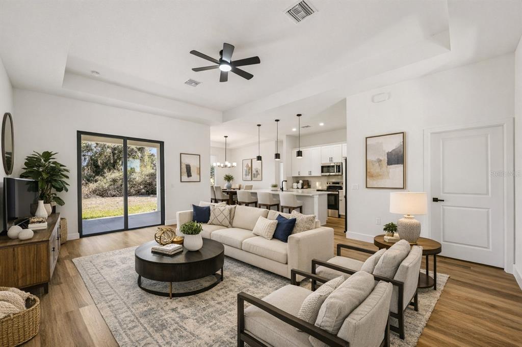 1852 Rada Lane North Port, FL 34288 - Photo 5 of 29 a living room with furniture and a large window