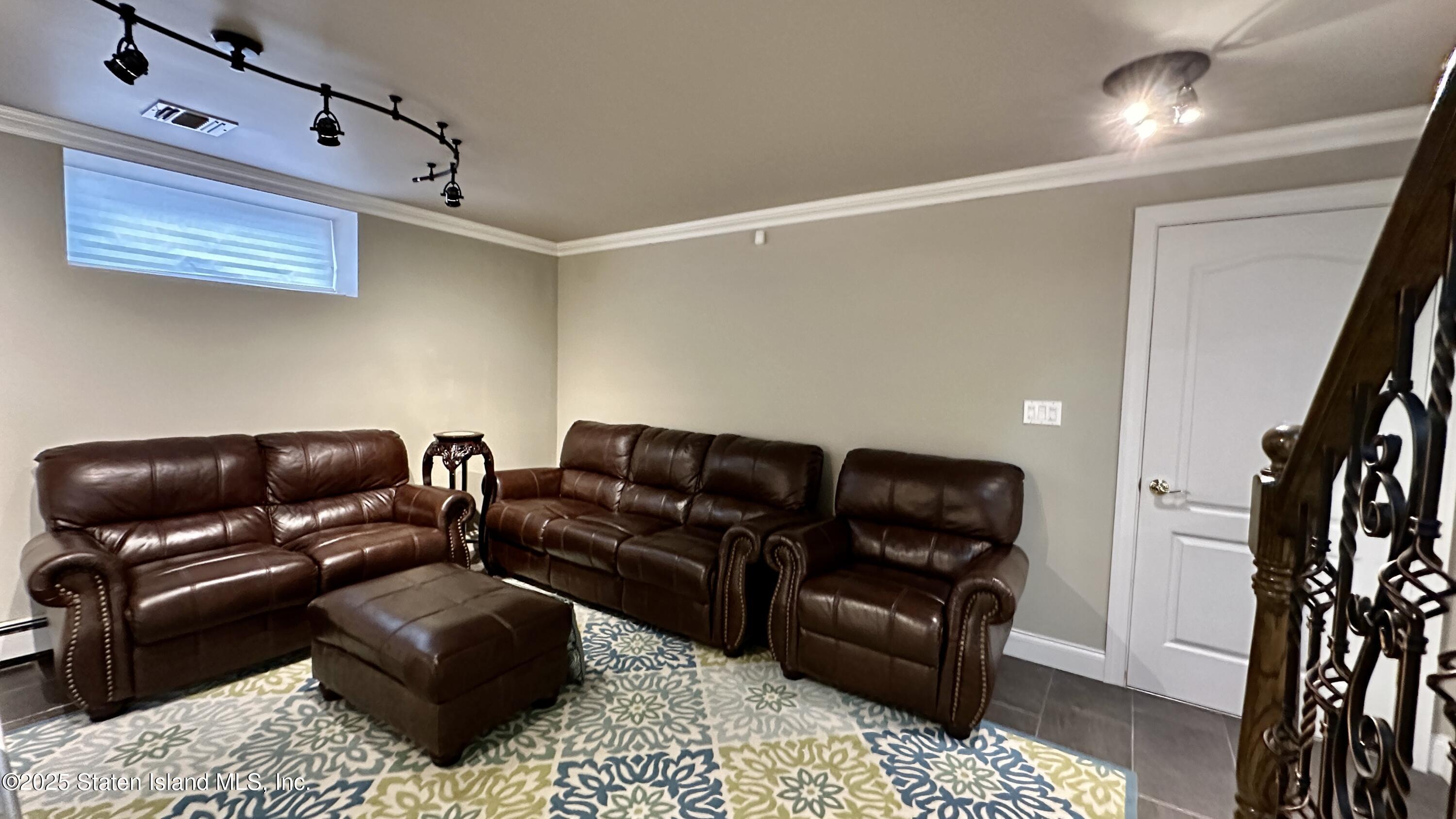998 Annadale Road Staten Island, NY 10312 - Photo 29 of 46 a living room with furniture
