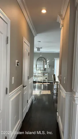 a view of living room with a wooden floor
