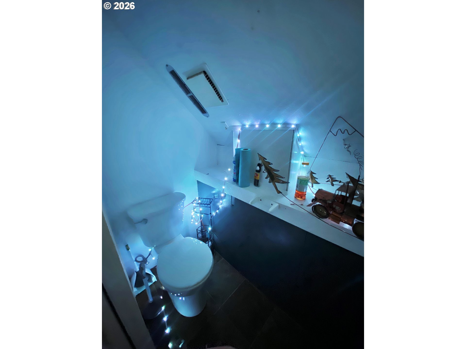 1609 Baker Street Baker City, OR 97814 - Photo 7 of 7 a living room with furniture and a mirror