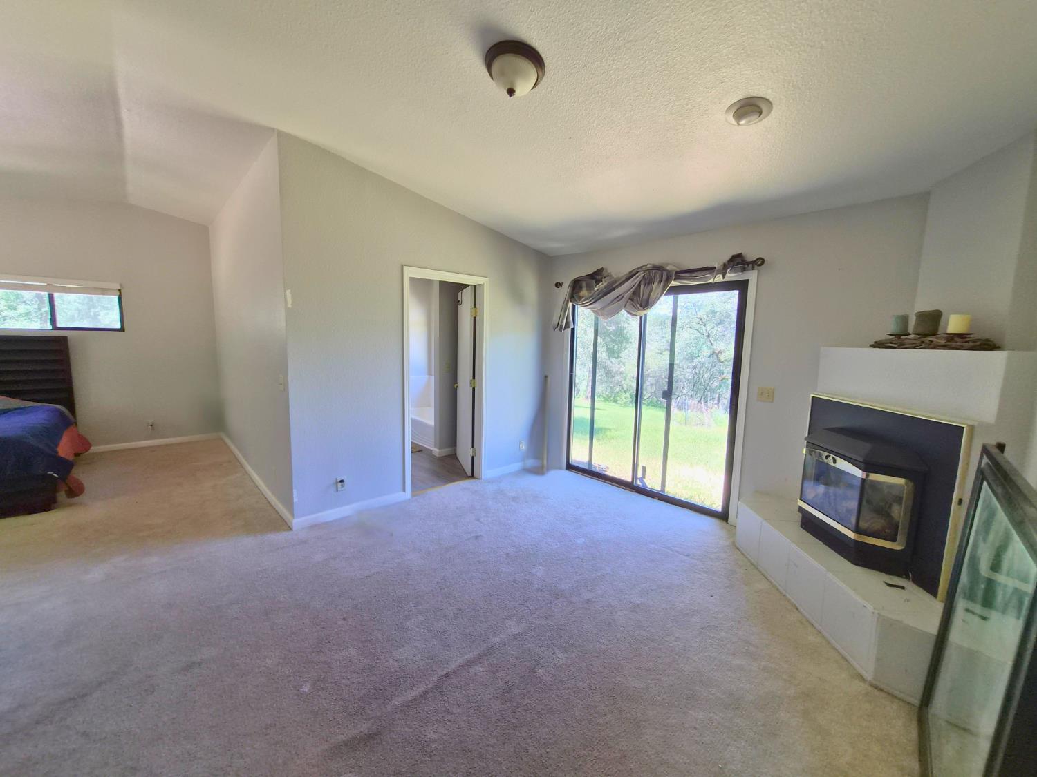 9568 Sheep Ranch Road Mountain Ranch, CA 95246 - Photo 9 of 34 bedroom sitting room with outdoor access
