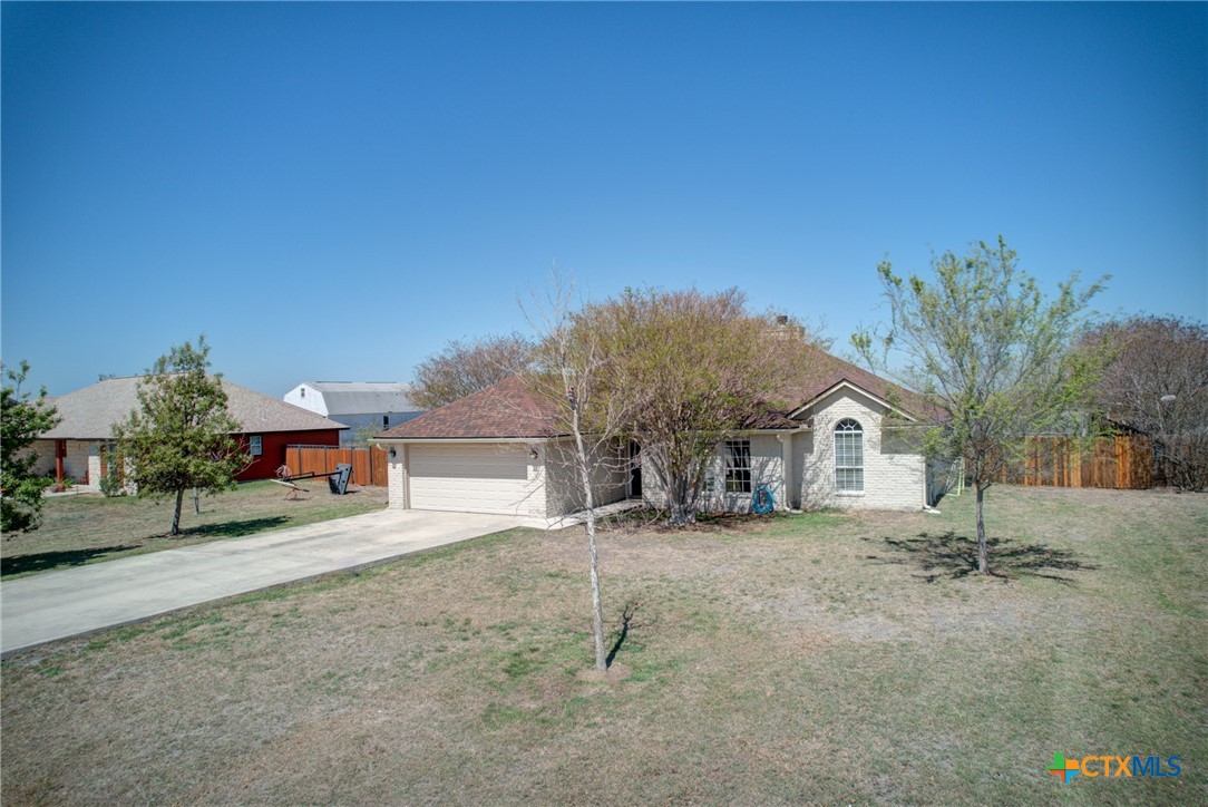 940 Cordova Loop Seguin, TX 78155 - Photo 2 of 32 a view of a house with a yard
