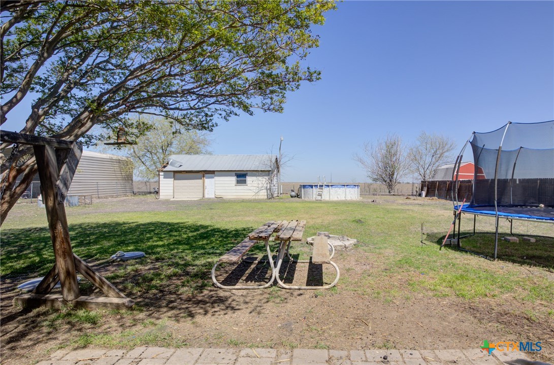 940 Cordova Loop Seguin, TX 78155 - Photo 29 of 32 a view of a house with backyard porch and sitting area