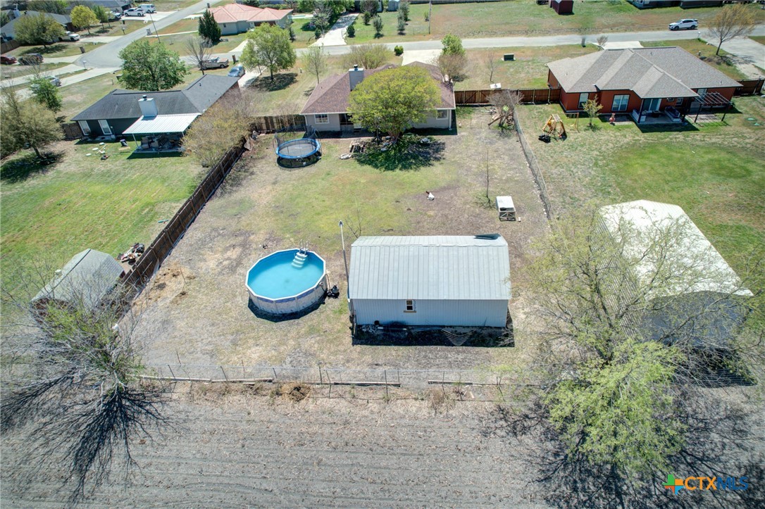 940 Cordova Loop Seguin, TX 78155 - Photo 30 of 32 an aerial view of a house with yard swimming pool and outdoor seating
