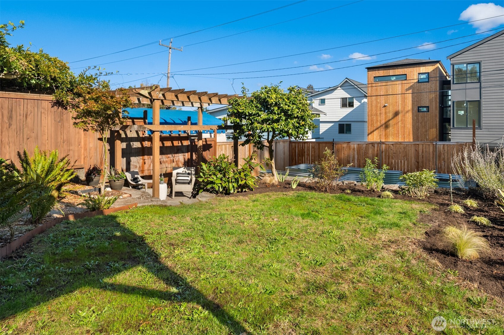 4026 52nd Avenue Southwest Seattle, WA 98116 - Photo 29 of 37 a view of a yard with plants