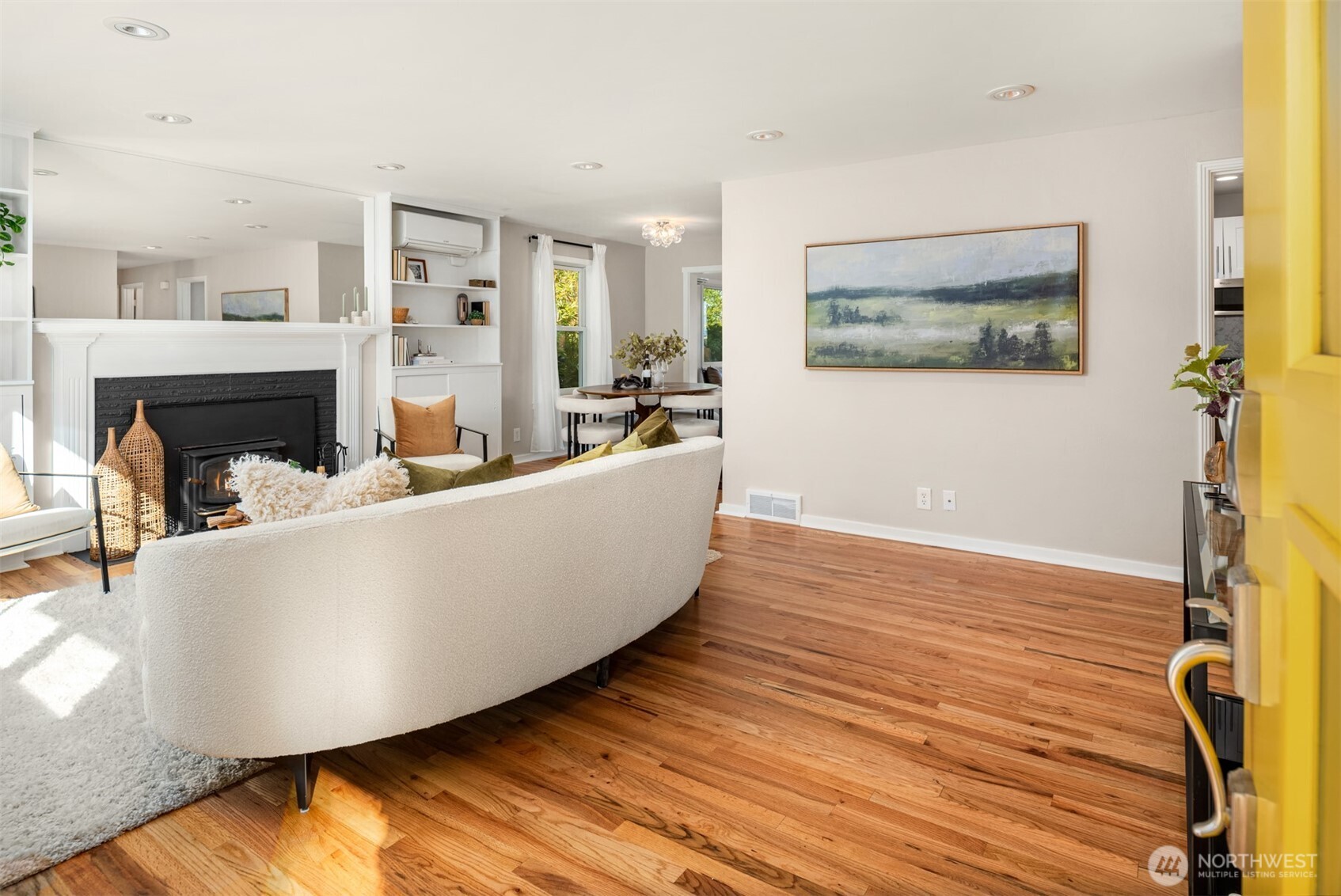 4026 52nd Avenue Southwest Seattle, WA 98116 - Photo 3 of 37 a living room with furniture and a wooden floor