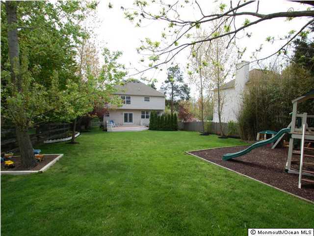 401 Old Bridge Road Brielle, NJ 08730 - Photo 3 of 3 a view of a house with backyard and a tree