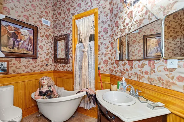 a view of a chairs and table in a patio