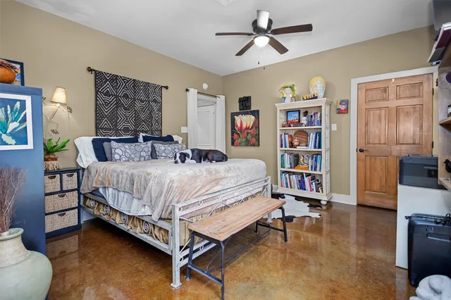 a view of a livingroom with furniture and a flat screen tv